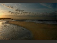 voir les reflets or sur la plage